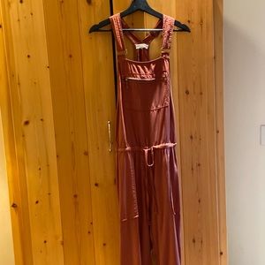 Lové Stitch rust colored romper size Medium